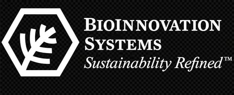 Bioinnovation Systems logo featuring a white hexagonal shape with a leaf icon and company name with tagline Sustainability Refined on black background